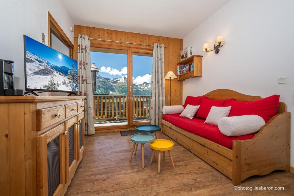 Photo de Orcières Appartement au pied des pistes avec piscine